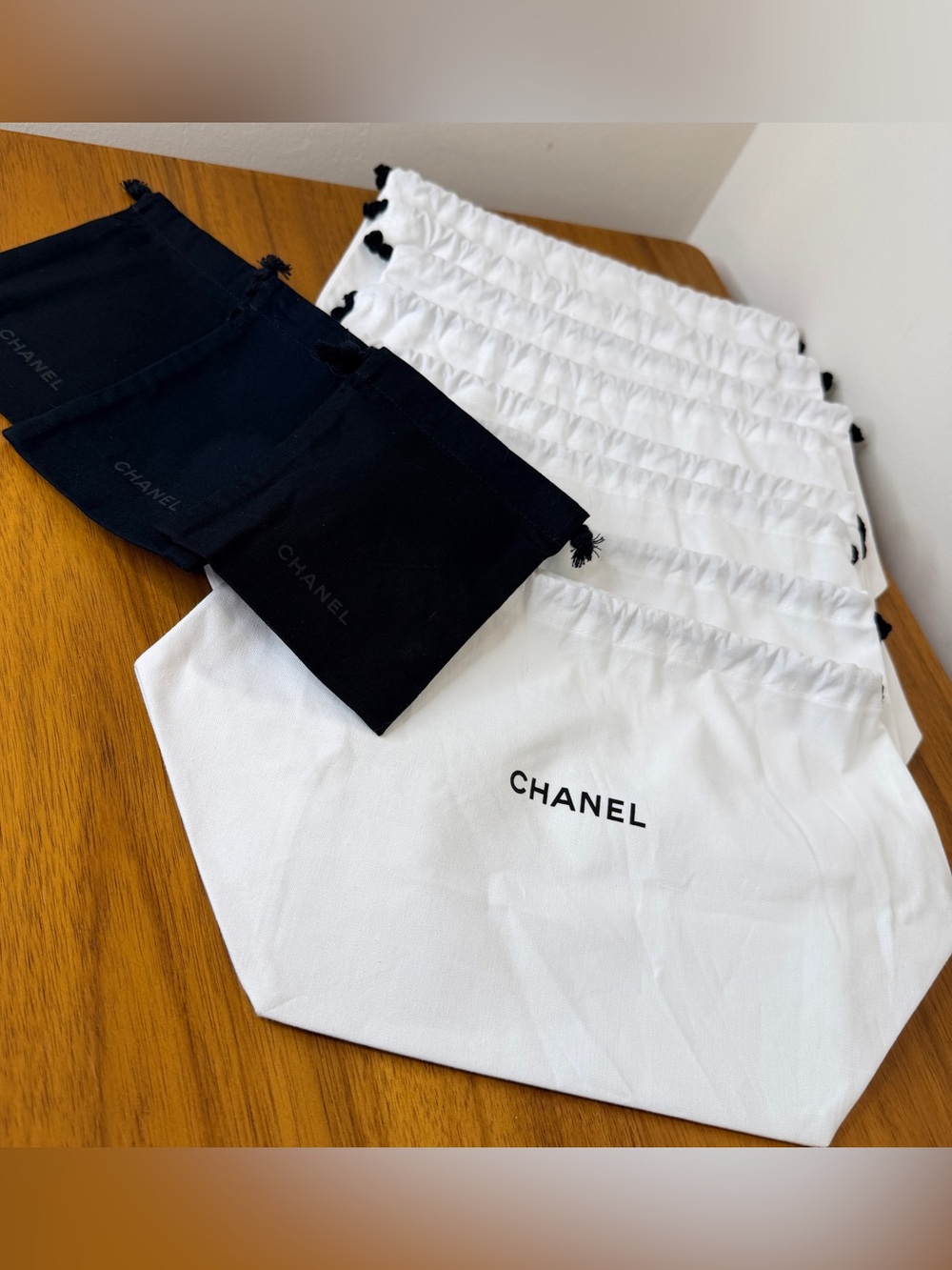 Lot of 7 Chanel Beauty White Drawstring Bags & 3 Black Pouches Storage Display